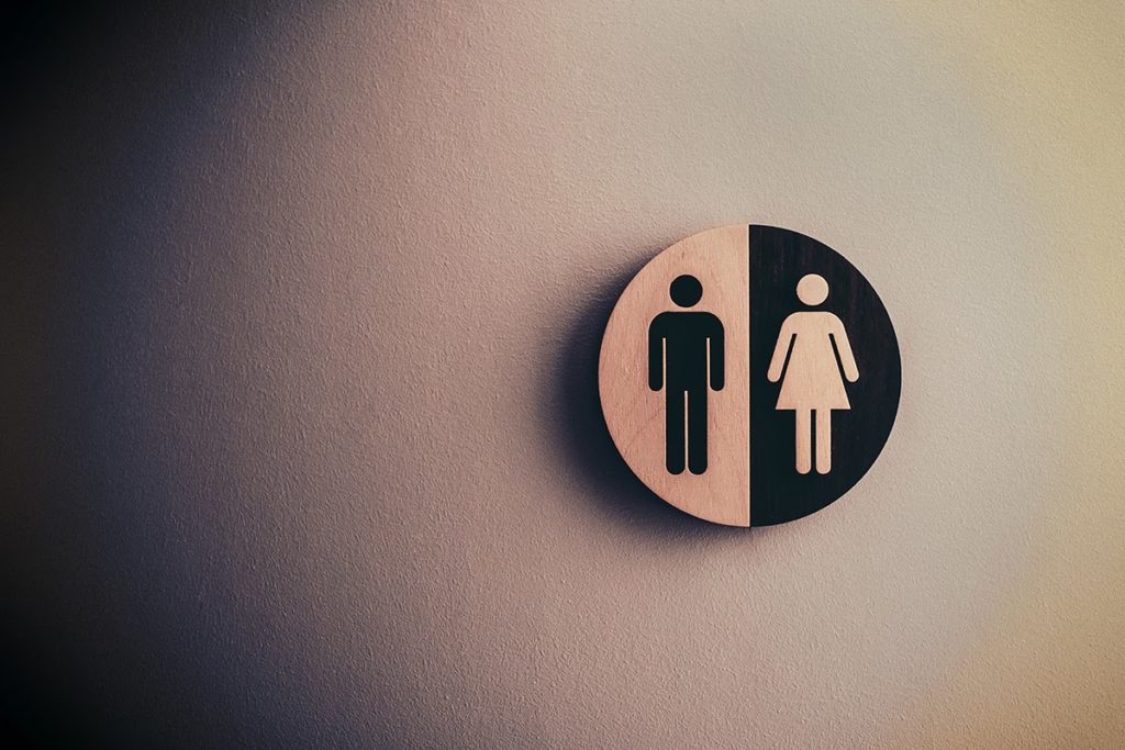 Simbolo de homem e mulher na parede